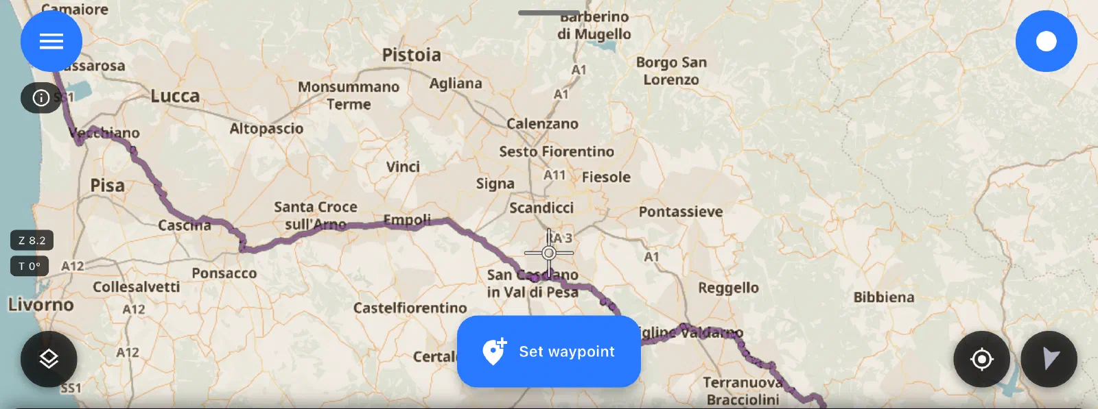 Map in MotoNavigator with the day's traced route: a purple line from the Valdarno through San Casciano in Val di Pesa, Empoli and Cascina, past Pisa and north toward Viareggio.